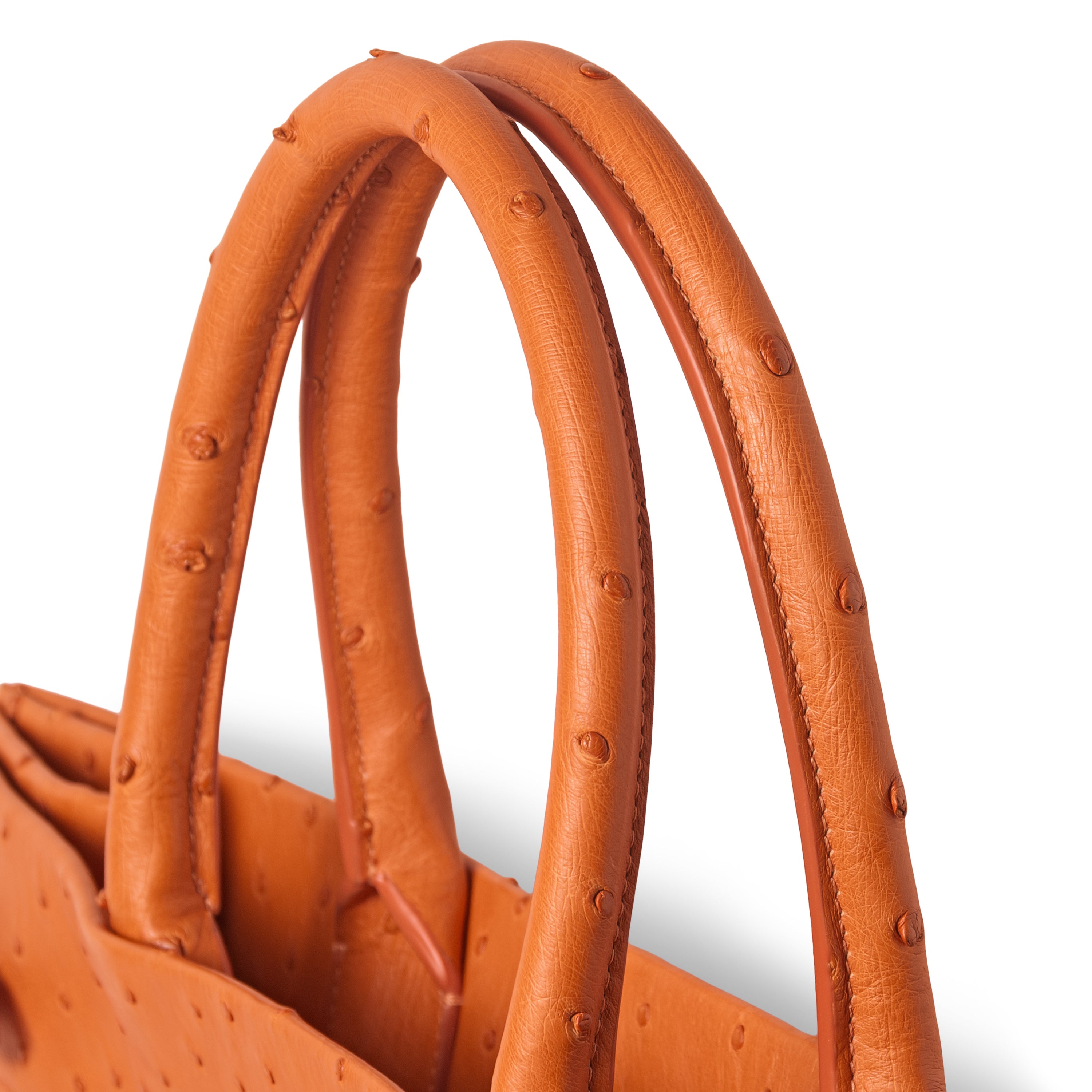 Italian ostrich leather handbag orange - side view showing quill pattern
