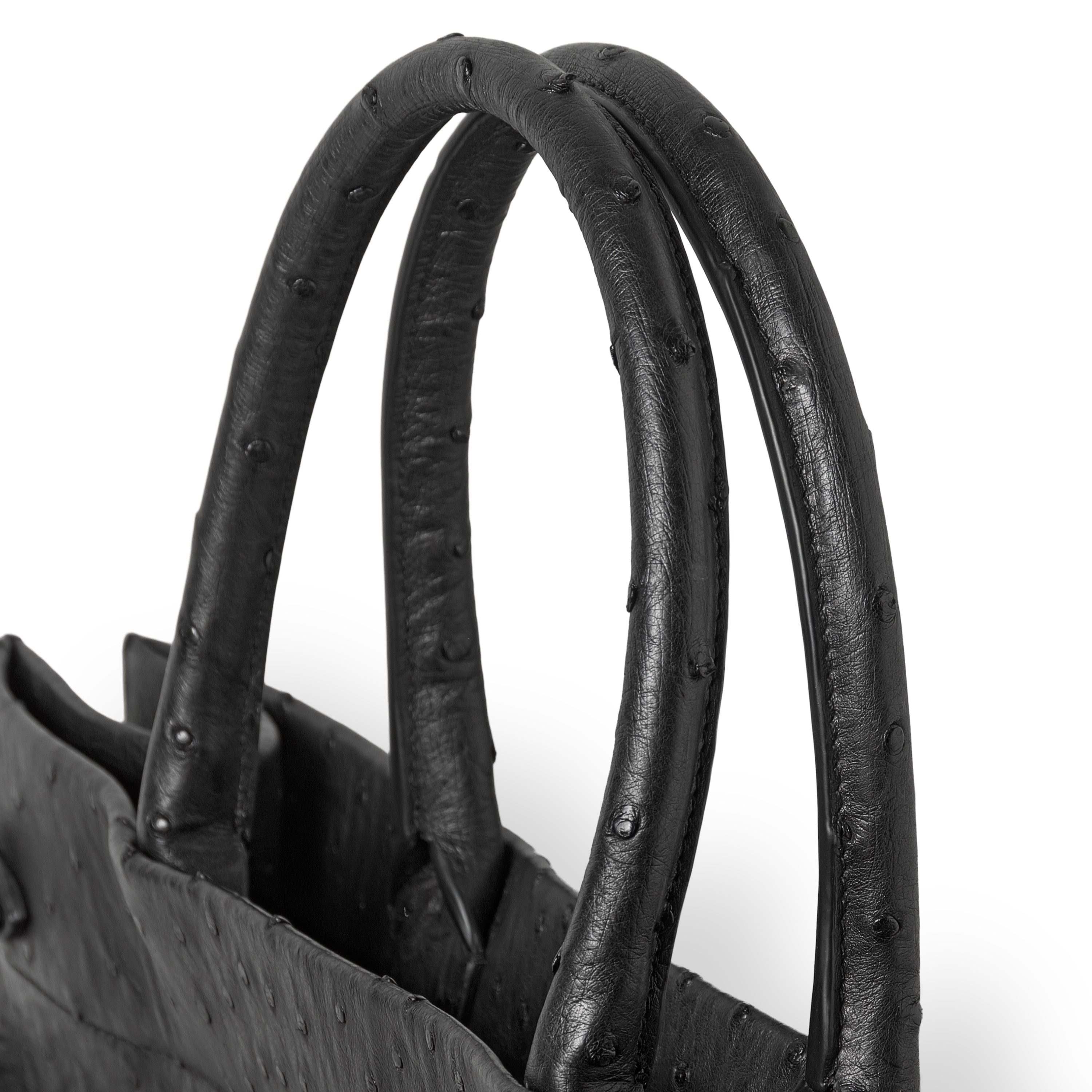 Italian ostrich leather handbag black - detail of natural quill pattern