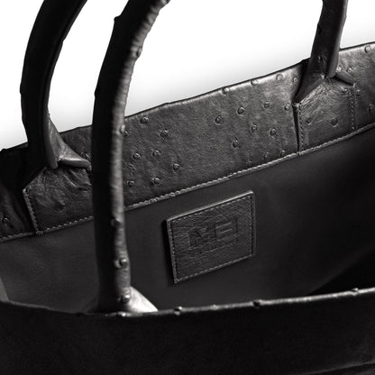 Luxury ostrich leather tote black - side view with calf leather lining